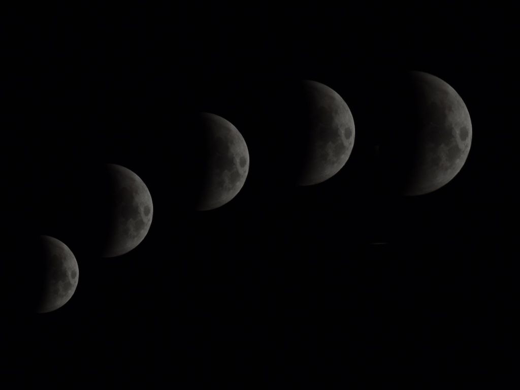 waxing crescent moons in the dark sky